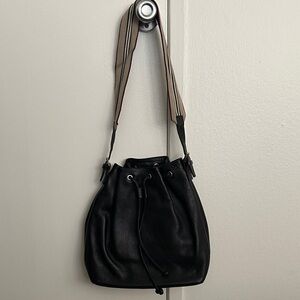 Black Leather Drawstring Bucket Bag with Striped Shoulder Strap
